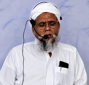 A photograph of Hazrat Sheikh taken during the program